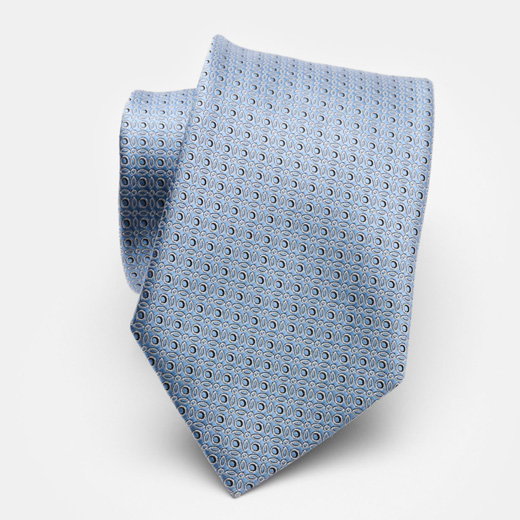 Hellblaue, eingedrehte Seidenkrawatte mit feinem, geometrischem Muster aus Ovalen und Kreisen auf weißem Hintergrund.