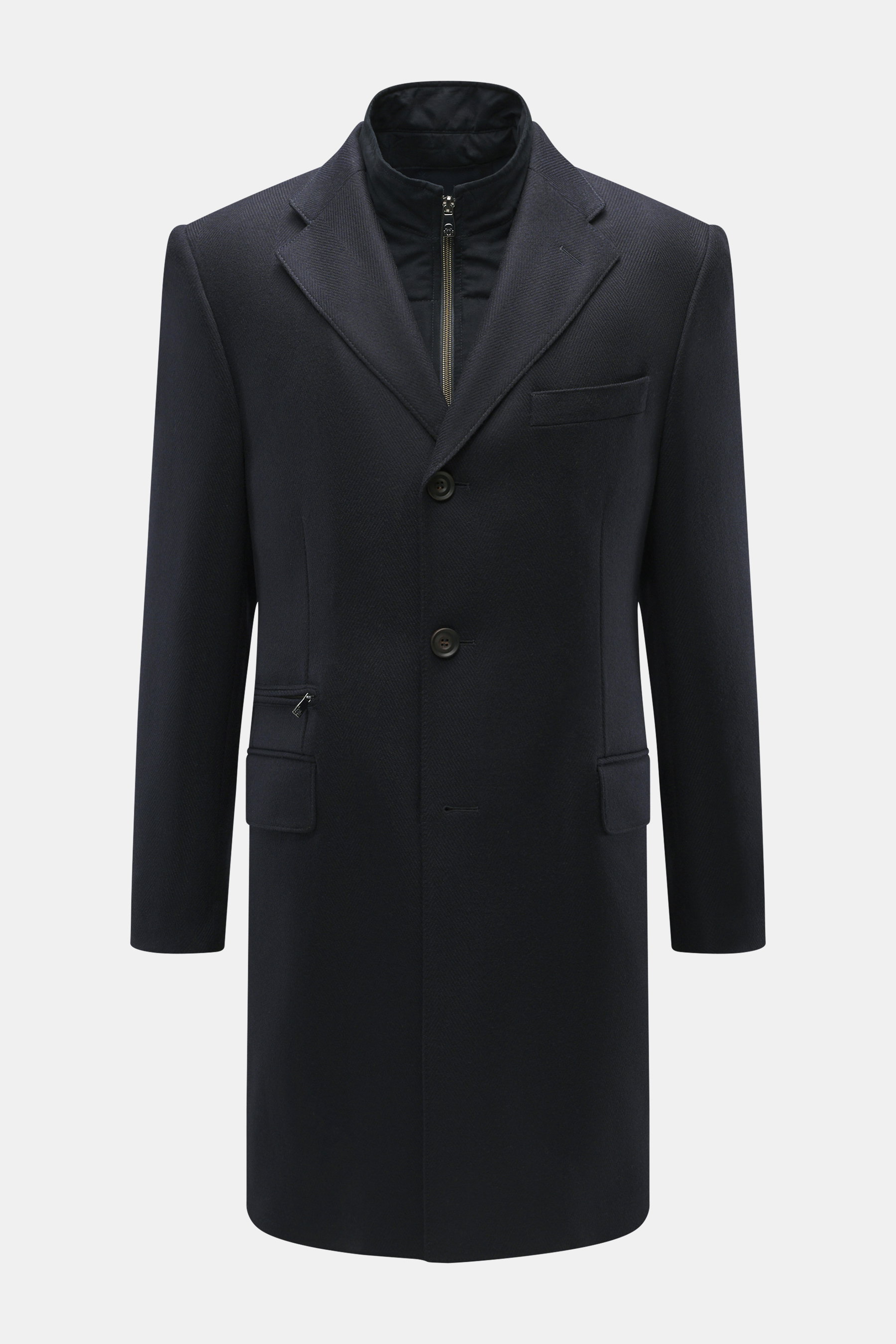 Corneliani Woll-Kurzmantel navy, frontale Nahaufnahme, Slim Fit, reine Schurwolle, tonales Fischgrat, herausnehmbare Double-Front, drei Knöpfe, Revers, Brust- und Pattentaschen, Zipper-Paspeltasche.