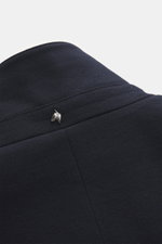Close-up rear view of Montecore Down short coat dark navy collar showing fine virgin wool texture and discreet metal logo. 

Description: <p>This exclusive short coat from MONTECORE made of fine virgin wool with a removable double front and warming down f