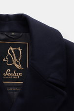 Close-up front view of Sealup Short pea coat 'Genova' dark navy showing wide lapel, soft wool and cashmere fabric, and inside label.