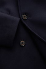 Close-up front view of the Sealup Short pea coat 'Genova' dark navy showing wool-cashmere fabric, double-breasted buttons, and wide lapel.