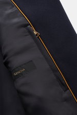 Close-up inside view of the Sealup Short pea coat 'Genova' dark navy showing smooth lining, zipped inside pocket, and wool-cashmere fabric edge.