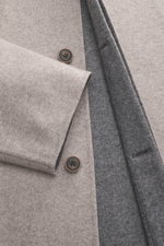 Close-up front view of Colombo Kid Cashmere fleece coat grey/taupe melange showing soft pure cashmere fabric, velour leather buttons, and unconstructed design with turn-down collar, five-button placket, and slant welt pockets, embodying luxury and minimal