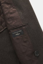 Close-up of the interior quilted lining and virgin wool fabric of the Tagliatore Wool Coat Dark Grey Melange, photographed from above.

<p>TAGLIATORE's signature understated elegance is expressed through this impeccably tailored double-breasted coat. Craf