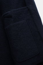 Close-up front side view of the Lunaria Cashmere Cashmere short coat navy showing soft pure cashmere fabric and flap pocket details.
