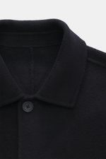 Close-up front view of Percival Coat 'Minnesota' navy, showing turn-down collar, five-button placket, pure wool, soft touch, Regular Fit, side seam pockets, unconstructed design.