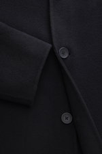 Close-up front view of Percival Coat 'Minnesota' navy showing pure wool fabric with a soft touch, five-button placket, turn-down collar, side seam pockets, Regular Fit, and unconstructed design.