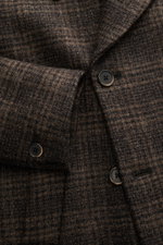 Close-up front view of the Barena Venezia Pea Coat grey-brown/dark brown patterned wool fabric with buttons and wide peaked lapel, highlighting its texture and design details.

Description: <p>Elegant through autumn and winter with BARENA VENEZIA: Inspire