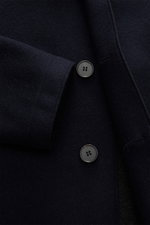 Close-up front view of Harris Wharf London Wool coat navy showing three-button placket, lapel, and felted virgin wool blend fabric.

Description: <p>A timeless look for the new season: This coat with a straight silhouette from HARRIS WHARF LONDON, made of