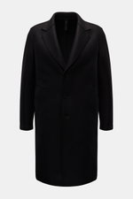 Harris Wharf London Wool coat black shown from the front, timeless unlined virgin wool coat with notch collar, three-button placket, slanted welt pockets, knee-length cut, and center back vent. Timeless, pure, and well thought out: This unlined coat with 