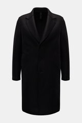 Harris Wharf London Wool coat black shown from the front, timeless unlined virgin wool coat with notch collar, three-button placket, slanted welt pockets, knee-length cut, and center back vent. Timeless, pure, and well thought out: This unlined coat with 