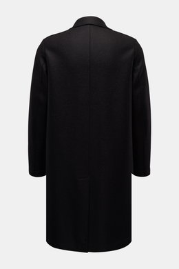 Rear view of Harris Wharf London Wool coat black in heavy, pure felted virgin wool, unlined with straight silhouette, center back vent, and clean lines.