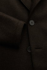 Close-up front view of Harris Wharf London Wool coat dark brown showing felted virgin wool texture, notch collar, and buttons.