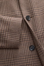 Close-up front view of Lardini Coat brown/beige checkered showing detailed check weave pattern, three-button placket, notch collar with flower pin, and slanted welt pocket, made from a mix of virgin wool and cashmere with a soft feel.
