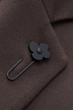 Close-up front view of Lardini Wool Coat dark brown fabric and black flower pin detail, light fabric made of pure virgin wool, soft feel, regular fit, three-button placket, notch collar with flower pin, slanted welt pockets, center back vent, smooth linin