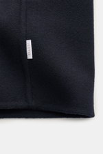 Close-up front view of 04651/ A trip in a bag Coat 'Double Coat' navy showing fabric texture and label, mix of virgin wool and microfiber, soft touch, slim fit, turn-down collar, five-button placket, slanted welt pockets.