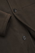 Close-up front angled view of the Brioni Dark Brown Sherling Coat showing noble suede leather, turn-down collar, and four-button placket.

Description: <p>This winter, you can shine with this noble suede leather coat by BRIONI, which also keeps you comfor