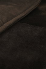 Close-up view of the Brioni Dark Brown Sherling Coat showing the noble suede leather and soft sherling lining texture.

<p>This winter, you can shine with this noble suede leather coat by BRIONI, which also keeps you comfortably warm thanks to the natural