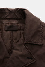 Stone Island Jacke 'David-TC Ghost Piece' dunkelbraun, Nahaufnahme Kragen und Innenfutter, robuste Baumwolle mit Anti-Drop-Finish.