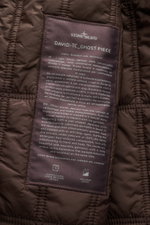 Stone Island Jacke 'David-TC Ghost Piece' dunkelbraun, Innenansicht des gesteppte Innenfutters mit Label zu Anti-Drop-Finish und Primaloft.