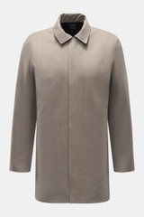 Front view of the UBR Rain coat 'Sky Fall Savile' taupe mottled, a slim fit, lightweight raincoat with a turn-down collar and concealed zip.

<p>The incredibly lightweight rain coat 'Sky Fall Savile' by UBR is made of smart merino wool and microfibre for 
