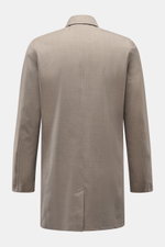 Rear view of UBR Rain coat 'Sky Fall Savile' taupe mottled, lightweight merino wool and microfibre blend, slim fit with centre back vent.

<p>The incredibly lightweight rain coat 'Sky Fall Savile' by UBR is made of smart merino wool and microfibre for eff