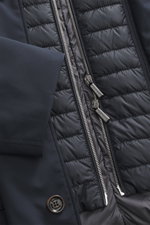 Close-up from above of the Moorer Down short coat 'Redon' navy showing water-repellent microfiber fabric, soft touch, light down filling, detachable double front and hood, three-button placket, snap button collar, classic breast pocket, zipper billett poc