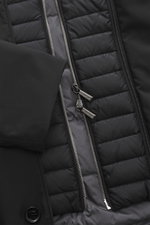 Close-up front view of the black Moorer Down short coat 'Redon' showing detailed zippers, quilted light down filling, and smooth microfiber fabric. Flexibly usable comfort against cold, wind, and rain is offered by the water-repellent short coat 'Redon' w