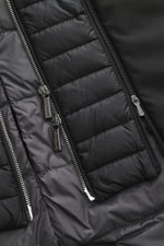 Close-up from above of the Moorer Down short coat 'Redon' black, showing water-repellent microfiber fabric, light down filling, and dual zippers with MOORER branding. Flexibly usable comfort against cold, wind, and rain is offered by the water-repellent s