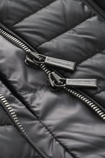 Close-up front view of the black Moorer Down short coat 'Redon' showing water-repellent microfiber fabric, dual zippers, and quilted light down filling for flexible comfort against cold, wind, and rain, with removable double front and detachable hood with