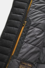 Close-up view of the Moorer Down short coat 'Redon' black, showing high-quality microfiber fabric, soft touch, water-repellent quilted lining, yellow zipper, and inner pockets. Flexibly usable comfort against cold, wind, and rain with light down filling, 