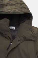Close-up front view of Stone Island Down short coat 'Micro Reps' olive, featuring high-quality microfiber, smooth feel, wind- and water-repellent fabric, warm down filling, slim fit, two-way zipper, wind flap with buttons, quilted hood, piped front pocket