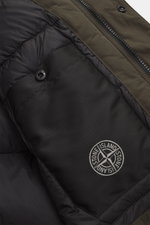 Close-up inside view of the Stone Island Down short coat 'Micro Reps' olive, showing quilted lining fabric, one inner pocket with snap button, high-quality microfiber, smooth feel, wind- and water-repellent material.