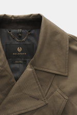 Close-up front view of the Belstaff Trenchcoat 'Supersenia' gray-brown with pure cotton twill, slim fit, adjustable lapel collar, and chest pocket.