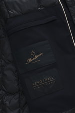 Close-up view of the Montecore Down short coat dark navy interior, showing quilted microfiber lining and brand labels.

Description: <p>This exclusive short coat from MONTECORE with removable double front and warming down filling stylishly accompanies you