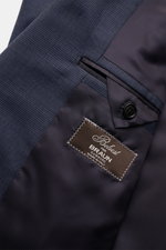 Close-up interior view of Belvest Anzug graublau meliert/schwarz kariert showing classic Glencheck wool fabric, smooth lining, and label.