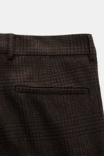 Close-up rear view of Brunello Cucinelli Suit black/brown checked trousers, showing fine glen check fabric with wool, cashmere, and silk blend, featuring hip pockets on the seat and belt loops. This suit by BRUNELLO CUCINELLI is what happens when Italian 