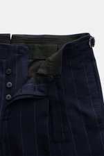 Close-up front view of Stile Latino Anzug 'Vincenzo' navy gestreift trousers showing button fly, side-adjuster, and fine navy chalk stripes.