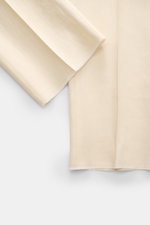 Tagliatore Leinenanzug 'Vesuvio' creme, Detailaufnahme Ärmel und Saum, reines Leinen, Slim Fit, tailliertes Sakko, sommerlicher Zweiteiler elegant und komfortabel.