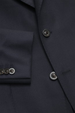 Close-up front view of the Boglioli Suit 'K. Jacket' navy showing tailored two-button jacket, notched lapel, patch hip pockets, tonal herringbone pure virgin wool fabric.