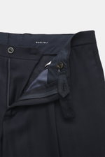 Close-up front view of the waistband and zipper of the navy Boglioli Suit 'K. Jacket' trousers, made from lightweight virgin wool with soft touch and fine tonal herringbone.