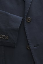 Close-up front view of the navy Boglioli Blazer 'K. Jacket' showing twill stretch cotton fabric, slim fit, notched lapel, two-button style, and kissing buttons on sleeve.

Description: Practical for the next business trip: With the uncomplicated and super