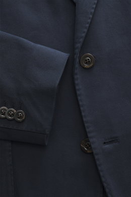 Close-up front view of the navy Boglioli Blazer 'K. Jacket' showing twill stretch cotton fabric, slim fit, notched lapel, two-button style, and kissing buttons on sleeve.

Description: Practical for the next business trip: With the uncomplicated and super