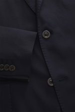 Close-up front view of the Boglioli Suit 'K. Jacket' dark navy, showcasing buttons and soft twill virgin wool fabric.
