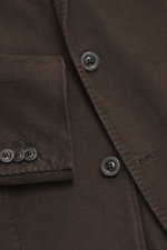 Close-up front view of the Boglioli Corduroy Suit 'K. Jacket' grey brown showing textured cotton blend fabric and branded buttons. Practical for the next business trip: With the casual yet elegant corduroy suit 'K. Jacket' by BOGLIOLI made from an elastic