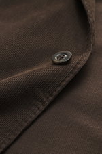 Close-up front view of the Boglioli Corduroy Suit 'K. Jacket' grey brown fabric and button, practical and elegant corduroy cotton blend.
