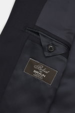 Close-up inside view of Belvest Suit navy showing smooth lining fabric, buttoned sleeve cuff, and label, made of pure super 150'S wool with soft feel, slim fit, tailored two-button jacket with notched lapel, classic breast pocket, hip pockets with flap, u