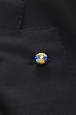 Close-up front detail of the Belvest Suit navy showcasing the colorful button on pure super 150's wool fabric with a soft feel, slim fit.