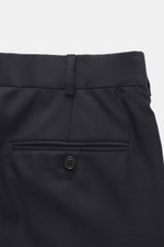 Belvest Suit navy close-up rear view of waistband and welted back pocket with button, pure super 150'S wool, soft feel, slim fit.