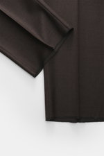 Belvest Suit grey brown melange close-up from above showing pure super 150'S wool, soft feel, slim fit, jacket with tailored two-button style, notched lapel with pin, classic breast pocket, flap hip pockets, unfinished sleeve cuffs, rear side vents, smoot